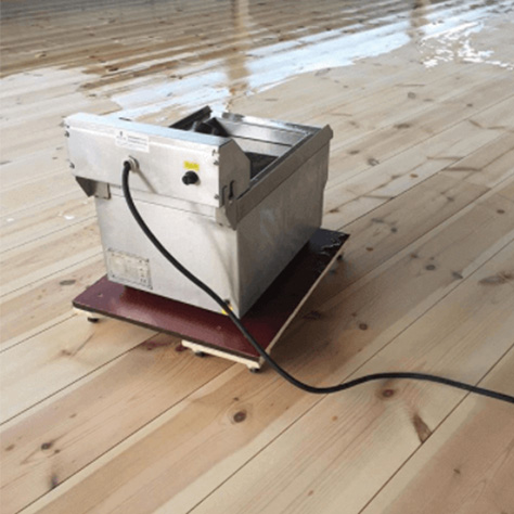 Sand and polish wooden floors with Selder's floor oil.